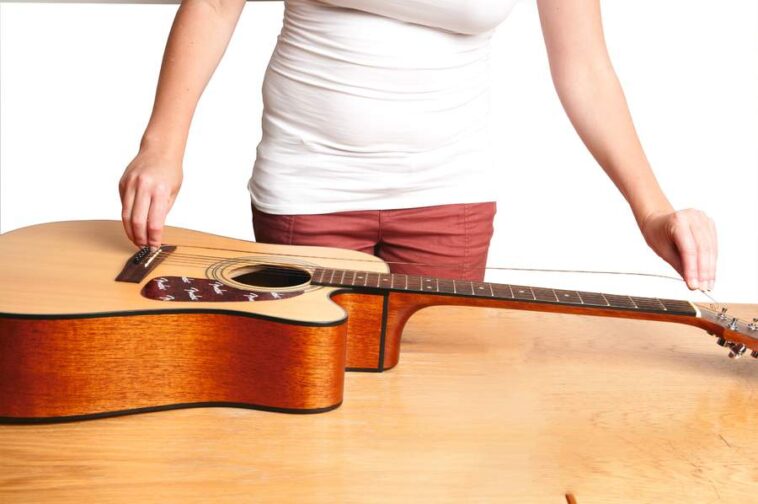 Broken strings? Lifeless tone? Terrible playing? It’s not you… It’s your strings: How to restring a guitar fast to play and sound great again