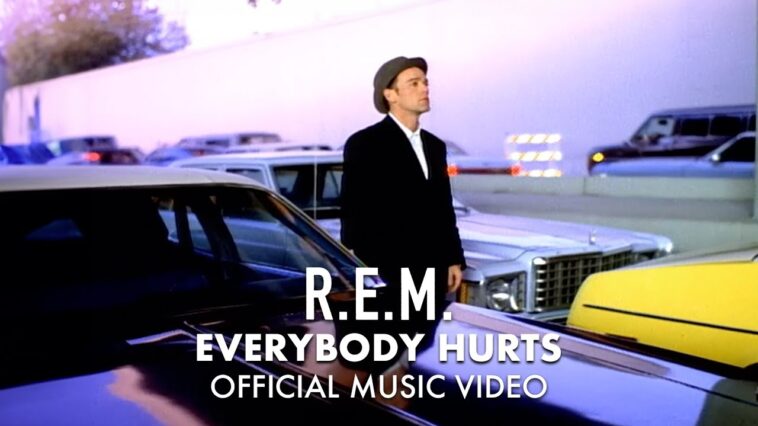 “Bill brought it in and it was a one-minute-long country and western song. It took us forever to figure out the arrangement and who was going to play what”: How REM turned a simple idea into a classic song of life-affirming power