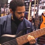 “I saw this big security-guard-looking dude staring at me. When I put the bass down, he grabbed me and said, 'Come with me’”: When Robert ‘Bubby’ Lewis mistook Andrew Gouché for a security guard – and ended up landing the gig with Snoop Dogg