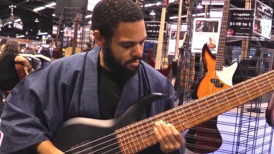 “I saw this big security-guard-looking dude staring at me. When I put the bass down, he grabbed me and said, 'Come with me’”: When Robert ‘Bubby’ Lewis mistook Andrew Gouché for a security guard – and ended up landing the gig with Snoop Dogg