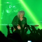 “I was like, ‘Oh my god, I’ve never done this before. If I move, he will fall over”: Dan Hawkins on the time he jammed “back to back” with Brian May onstage
