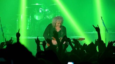 “I was like, ‘Oh my god, I’ve never done this before. If I move, he will fall over”: Dan Hawkins on the time he jammed “back to back” with Brian May onstage