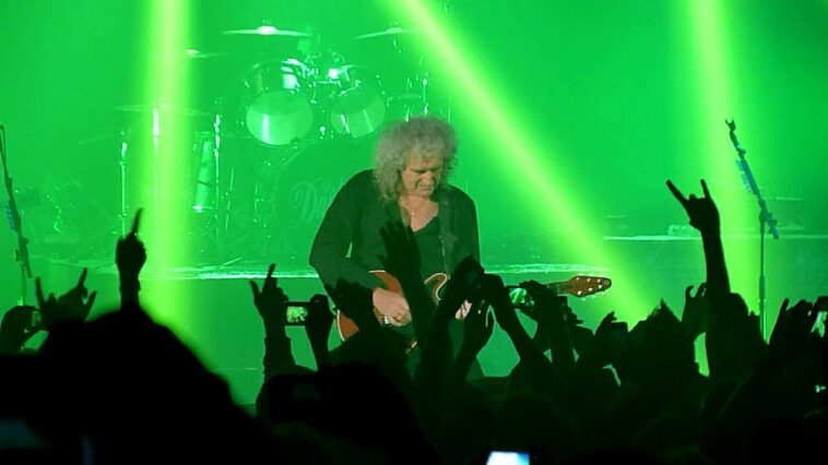 “I was like, ‘Oh my god, I’ve never done this before. If I move, he will fall over”: Dan Hawkins on the time he jammed “back to back” with Brian May onstage