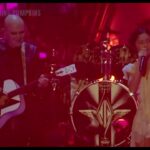 Olivia Rodrigo ticks another name off her alt-rock wishlist as she joins Smashing Pumpkins on stage at Lollapalooza to sing Thirty Three