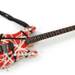 Two Eddie Van Halen guitars with cigarette butts up for auction