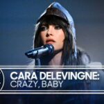 Cara Delevingne showcases her two-hand tapping chops as she returns to Jimmy Fallon: “Everyone thought it was a party trick. It was actually foreshadowing”