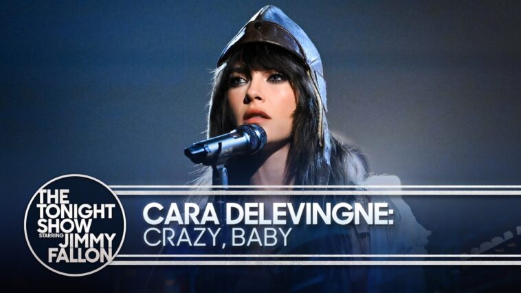 Cara Delevingne showcases her two-hand tapping chops as she returns to Jimmy Fallon: “Everyone thought it was a party trick. It was actually foreshadowing” 18 Cara Delevingne showcases her two-hand tapping chops as she returns to Jimmy Fallon: “Everyone thought it was a party trick. It was actually foreshadowing”