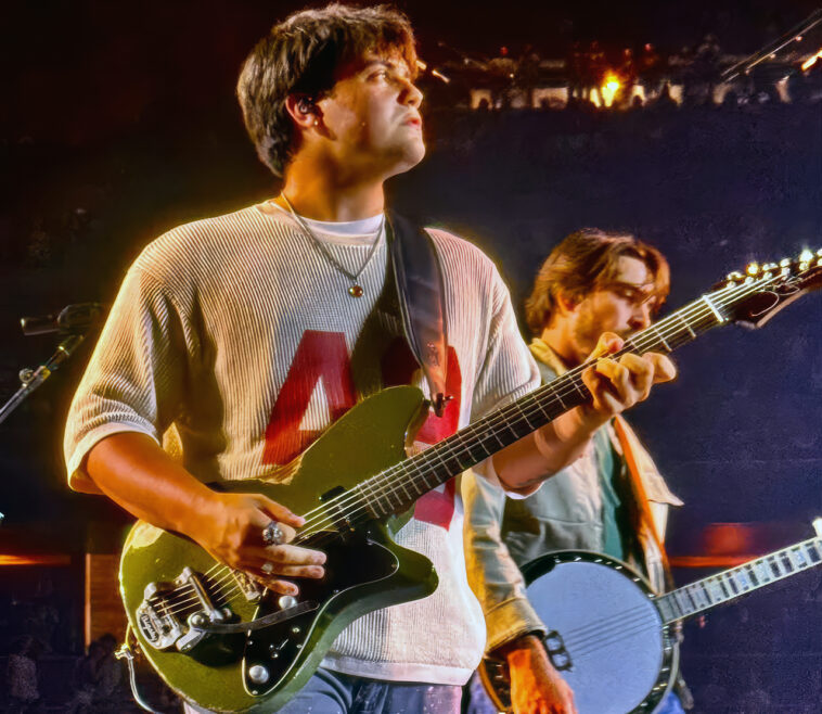 “I ran over to the student center, unenrolled from all my classes and hit the road”: Noah Kahan was an unknown when his guitarist got the gig. Now he’s playing Fenway Park with his own signature guitar