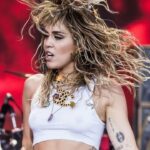 “My guitar is like my best friend. My guitar can get me through anything”: As she enters a new era by dropping the Cyrus name and rocking out in a white jumpsuit with a black Fender Strat, here’s what Miley has said about playing guitar 28 “My guitar is like my best friend. My guitar can get me through anything”: As she enters a new era by dropping the Cyrus name and rocking out in a white jumpsuit with a black Fender Strat, here’s what Miley has said about playing guitar