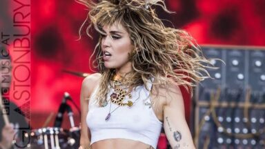 “My guitar is like my best friend. My guitar can get me through anything”: As she enters a new era by dropping the Cyrus name and rocking out in a white jumpsuit with a black Fender Strat, here’s what Miley has said about playing guitar