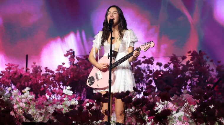 Olivia Rodrigo showcases custom guitar builds on her Unraveled Tour