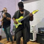 Tosin Abasi and Javier Reyes of Animals As Leaders playing Tooth And Claw at NAMM 2020 for Fishman 26 Tosin Abasi