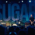 “We’re not trying to kill people with it anymore.” Bob Mould says Sugar is playing at lower volume. Try telling that to their diehard fans