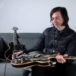 “When you stand onstage with Liam and he’s singing those songs, it’s incredible… He brought the vibe in bucketloads”: Barrie Cadogan on Liam Gallagher, Morrissey, and Primal Scream – and how John Squire started it all