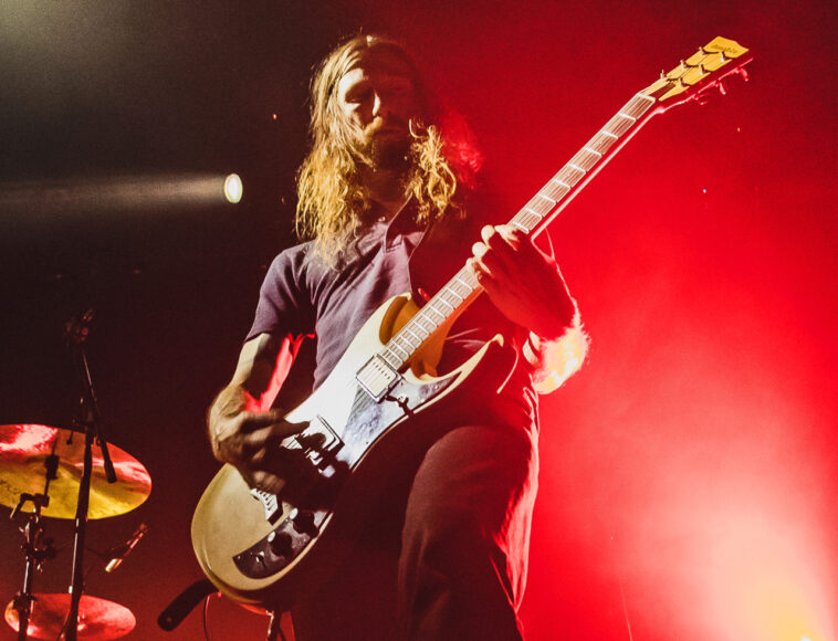 “I just bring one guitar on tour and force it through every tuning possible. It’s easier. I’ll adjust one string up or down almost every song”: Russian Circles’ heaviness comes from restraint, not distortion