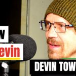Why is metal guitarist Devin Townsend out on the road again just a year and a half after taking an “indefinite” break from touring?: “Financial armageddon”